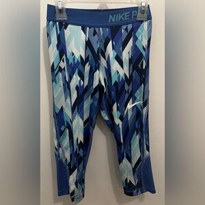Nike Girl’s DryFit Athletic Leggings,
Size Medium, Patterned